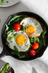 Fried eggs on a pan for breakfast