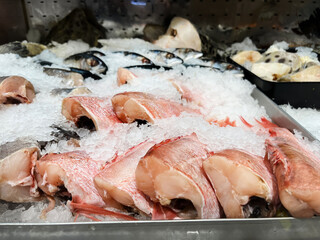 Headless Redfish (Sebastus marinus) Displayed in a Specialty Store on a Bed of Ice