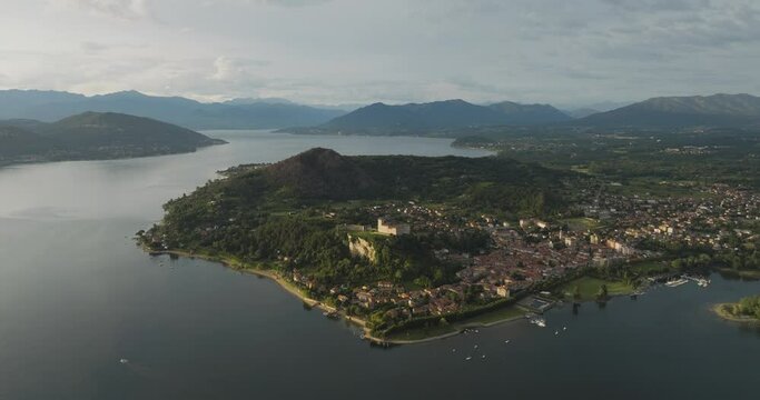 Aerial view of Angera, a small town along Lago Maggiore (Lake Maggiore) at sunset, Lombardy, Italy.