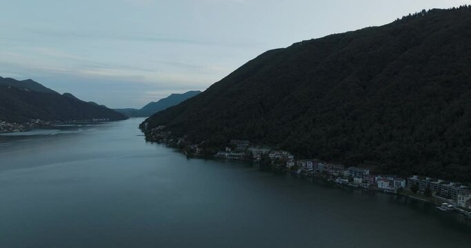 Aerial view of Lugano lake at sunset, Melide, Ticino, Switzerland.