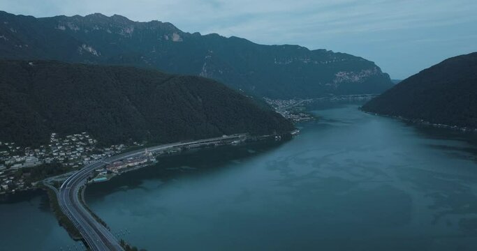 Aerial view of Lugano lake at sunset, Melide, Ticino, Switzerland.
