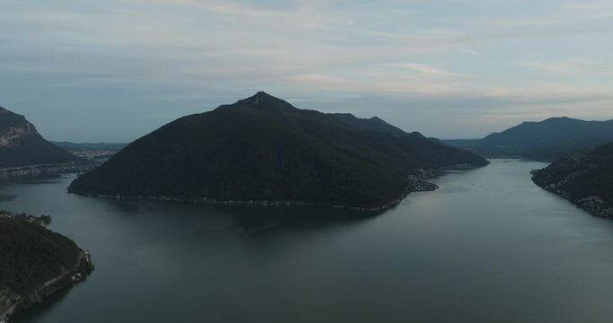 Aerial view of Lugano lake at sunset, Melide, Ticino, Switzerland.