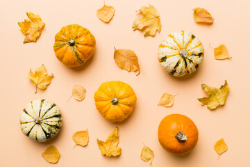 Autumn composition. Pattern made of dried leaves and other design accessories on table. Flat lay, top view