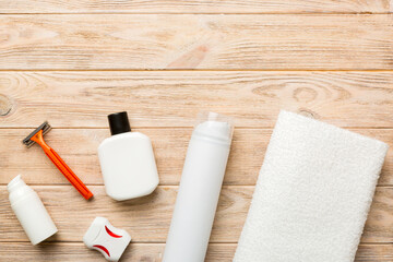 Composition with bath cosmetics on table. razor, toothpaste, soap, gel, toothbrush, mouthwash and other various accessories. Cosmetics for skin health. Bath Mockup for your logo