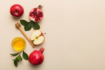 Flat lay composition with symbols jewish Rosh Hashanah holiday attributes on colored background, Rosh hashanah concept. New Year holiday Traditional. Top view with copy space