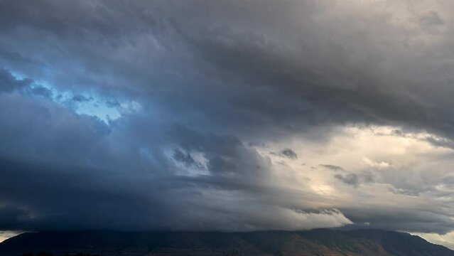 Timelapse of cloud layers over mountain as storm moves through Brigham City, Utah.