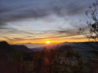 Naklejka na ściany i meble Beautiful view of the sunrise landscape in the morning on Mount Bromo