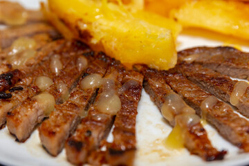 Traditional Brazilian dish, "carne de sol" with cassava and bottled butter