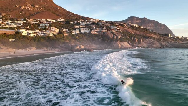 Aerial view of Cape Town residential district along the coastline near Llandudno beach at sunset, Cape Town, South Africa.