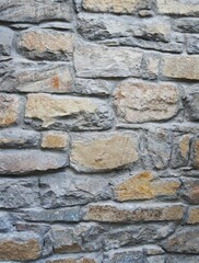 Brick wall background texture close up. Dirty brick wall with peeling plaster