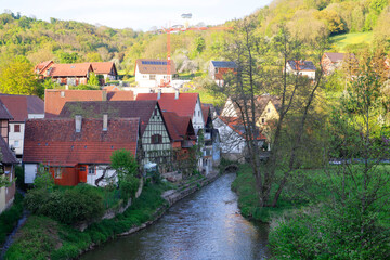 Obraz premium The River Jagst in the Village Bächlingen - Baechlingen - Langenburg, Hohenlohe, Baden-Württemberg, Germany, Europe