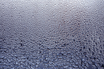 Abstract glass background with natural water condensation. Design pattern close up