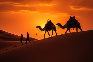 Cameleers guide camels through Thar Desert at picturesque sunset