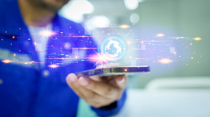 Engineers monitor electrical energy usage using a mobile phone app and display holographic graphics using AI. concept of energy conservation and technology. Technology and Energy saving concept