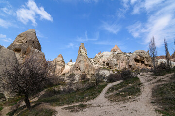 Giant rock and sand formations in touristic Cappadocia.Museum and fairy chimneys in Cappadocia, Turkey.