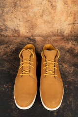 Yellow chukka style leather boots