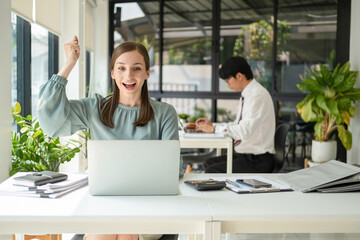 Overjoyed businesswoman happy for successful work.