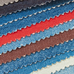 Colorful collection of Denim textile samples. Multicolor Fabric texture background