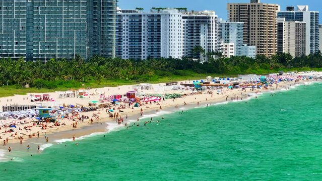 Aerial parallax drone stock footage Miami Beach Florida 7x zoom
