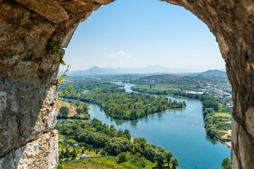 Looking at the lake from the arch of the Rozafa Castle wall in the city Shkoder. Albania