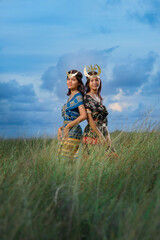 beautiful womens wearing local clothes from the Sumba and rote island. traditional clothing of...