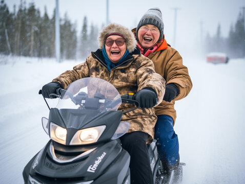 A Photo of an Elderly Couple Enjoying a Snowmobile Ride