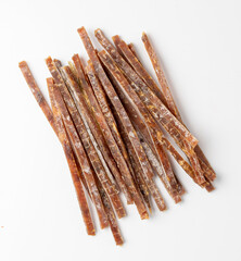 Fish Jerky Isolated, Dry Salted Seafood Snack, Hake Stockfish, Small Pieces of Dehydrated Pollock