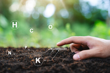 Testing fertile soil outdoors in close-up and with needed for planting. future agriculture Smart...