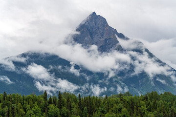 Hagwilget mountain peak in the clouds, Hazelton, British Columbia, Canada