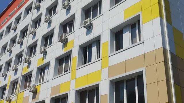 building with a lot of air conditioning.