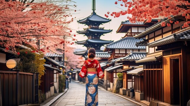 Asian woman wearing japanese traditional kimono at yasaka pagoda and sannen zaka street in kyoto, japan