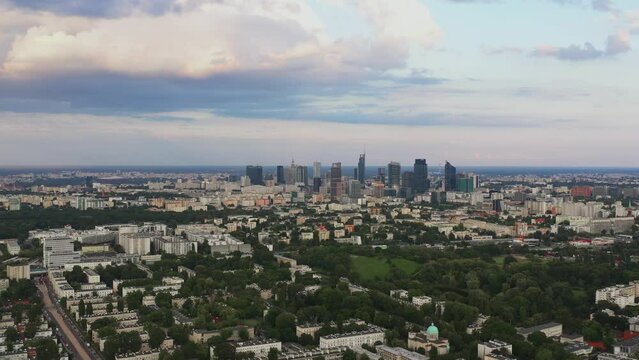 Warsaw urban skyline downtown aerial view cinematic view. Skyscrapers in the city center. Top view of the metropolis during sunset. CInematic view.
