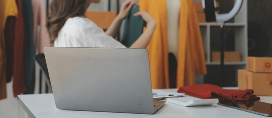 Online seller owner. Online shopping. Business Start up SME concept. Young startup entrepreneur small business owner working at home, packaging and delivery situation.