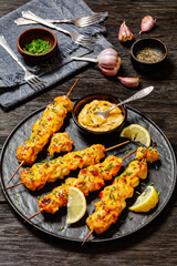 Bang Bang Chicken Skewers on plate, top view
