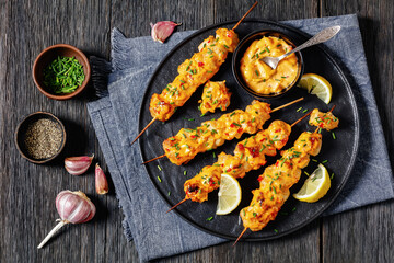 Bang Bang Chicken Skewers on plate, top view