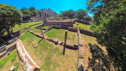 Apollonia's Arc of Triumph and Bouleuterion, an ancient assembly hall in Albania. Aerial view of the historical heritage of this Greek city. Apollonia is an UNESCO World Heritage site.