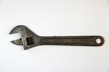Adjustable wrench on white background