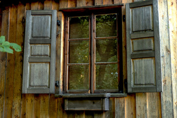 Fototapeta na wymiar Old Vintage Wooden House Window,wood window open of an old wooden house