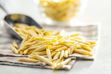 Fusilli pugliesi. Italian twisted pasta in scoop.