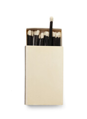 Black matches in a box on a white background.