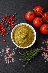 Delicious fresh pasta consisting pesto sauce with salt, spices and herbs