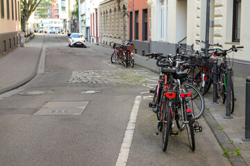 Modern bicycles parked on city street
