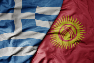 big waving national colorful flag of greece and national flag of kyrgyzstan .