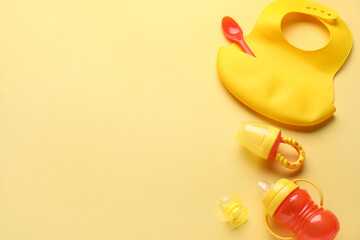 Composition with colorful baby accessories on color background