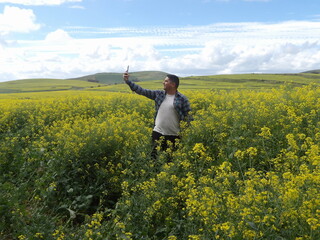 Farmer taking a selfie picture on a farm