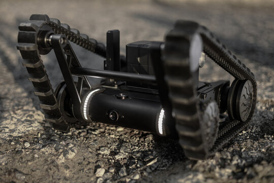 a robot designed to work with hazardous materials in difficult conditions. Its ability to move on gravel for use in a variety of applications.