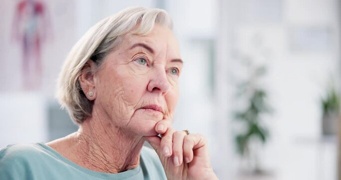 Memory, medical and senior woman in clinic for wellness consultation in a medicare hospital. Healthcare, reflection and elderly female patient with a thinking face expression in a clinic for checkup.