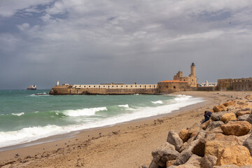 The Lighthouse of the Admiralty in Algiers, Alger, Algeria. View from the beach. Stormy weather and...