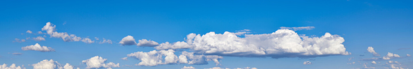 Obraz premium Blue sky background with white clouds. Cumulus white clouds. Panoramic widescreen image