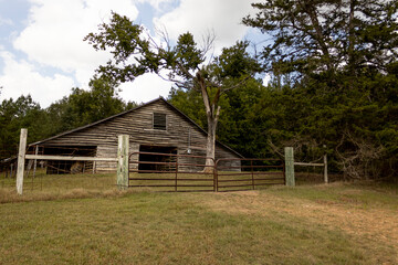 Old weathered horse barn in the country.